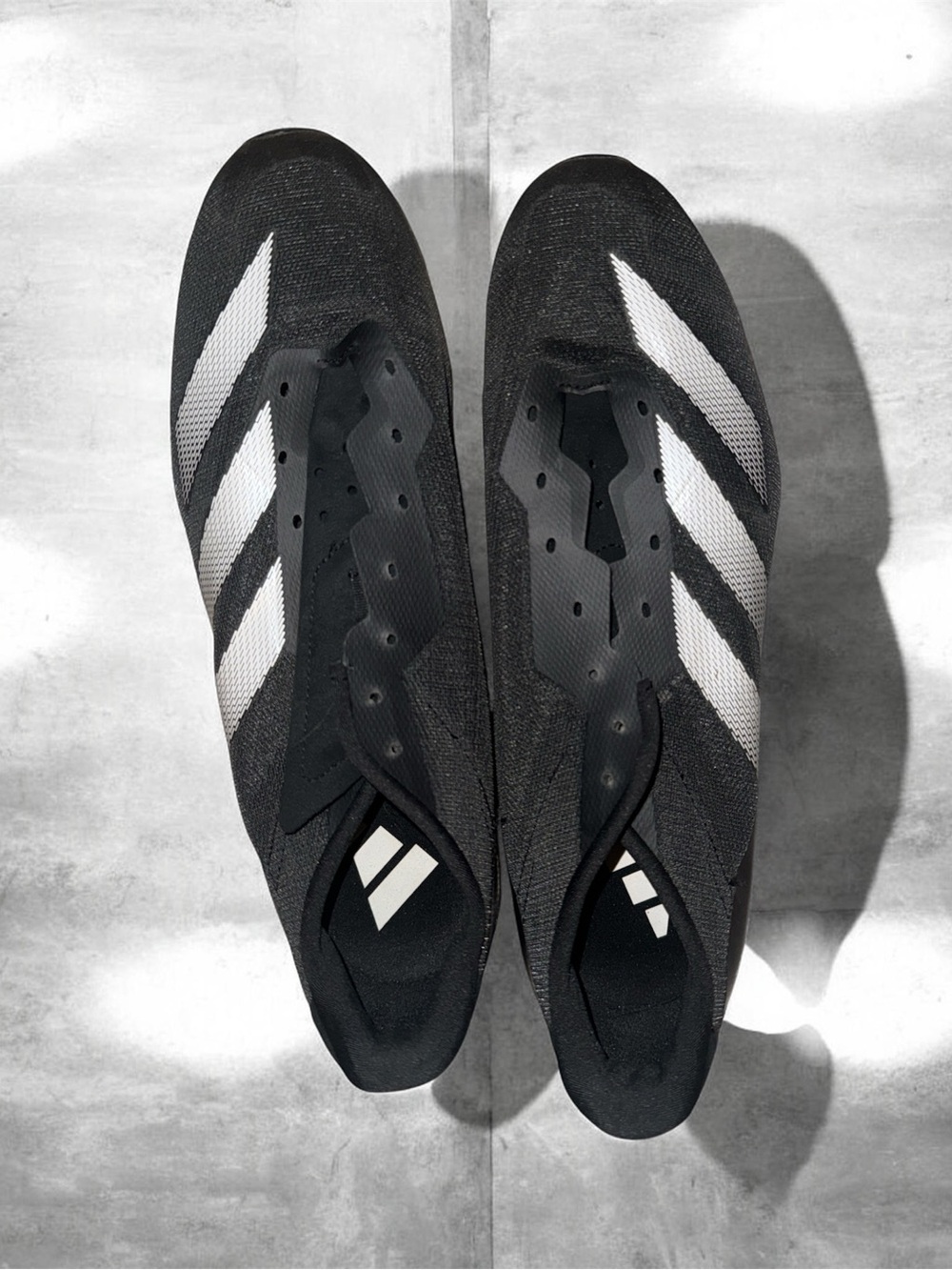 adidas Men's Black & White track spikes